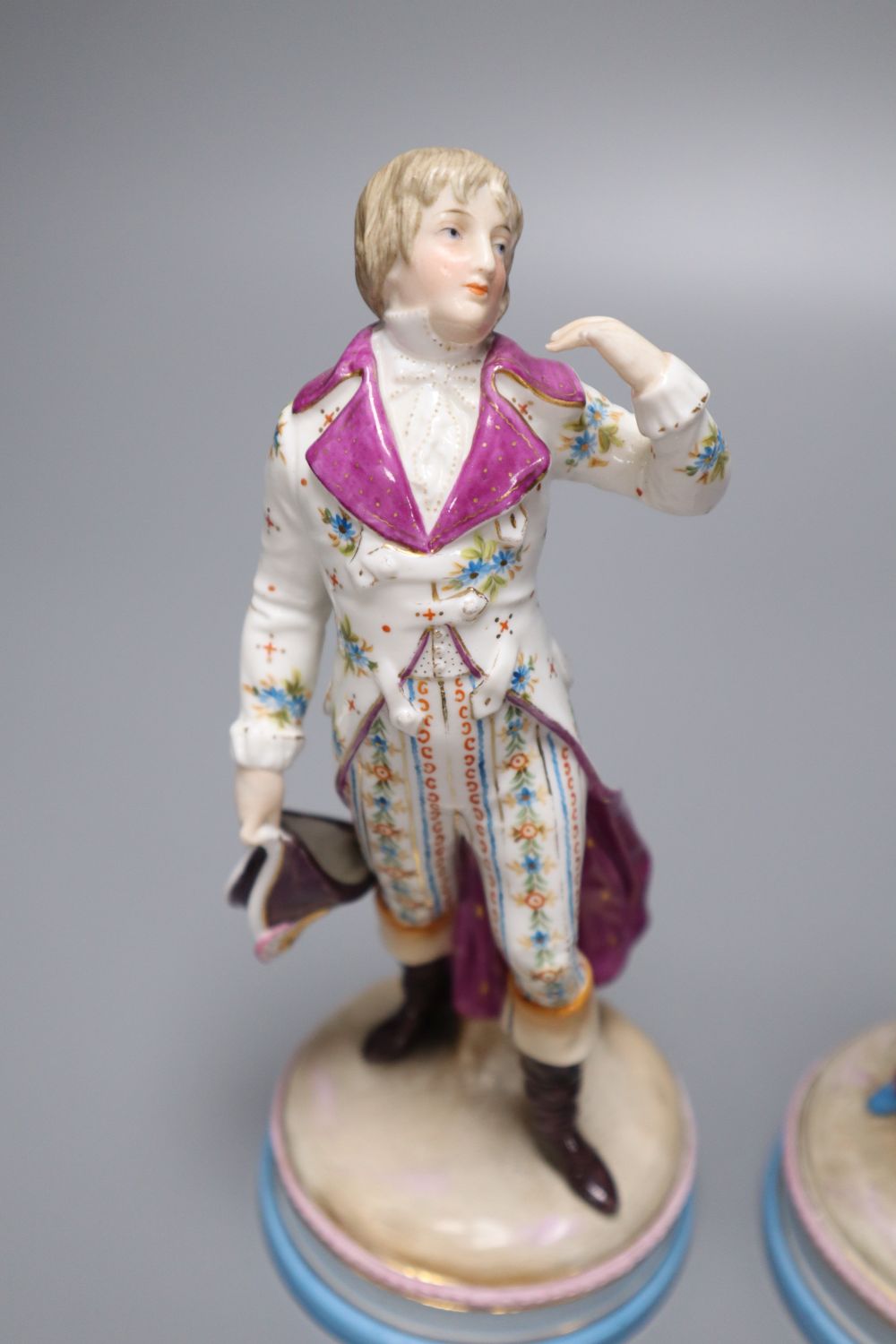 A pair of KPM Berlin porcelain figures of a maiden and a gallant, height 22cm